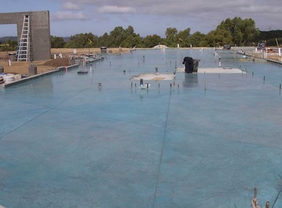 Acid-stain floor under construction, decorative concrete