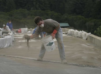 Dust-on color hardener application for Tom Ralston Concrete